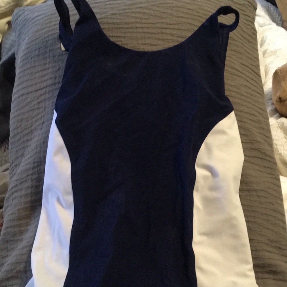 TORY BURCH Navy and White woman’s One Piece Swimsuit. In great condition/shape.